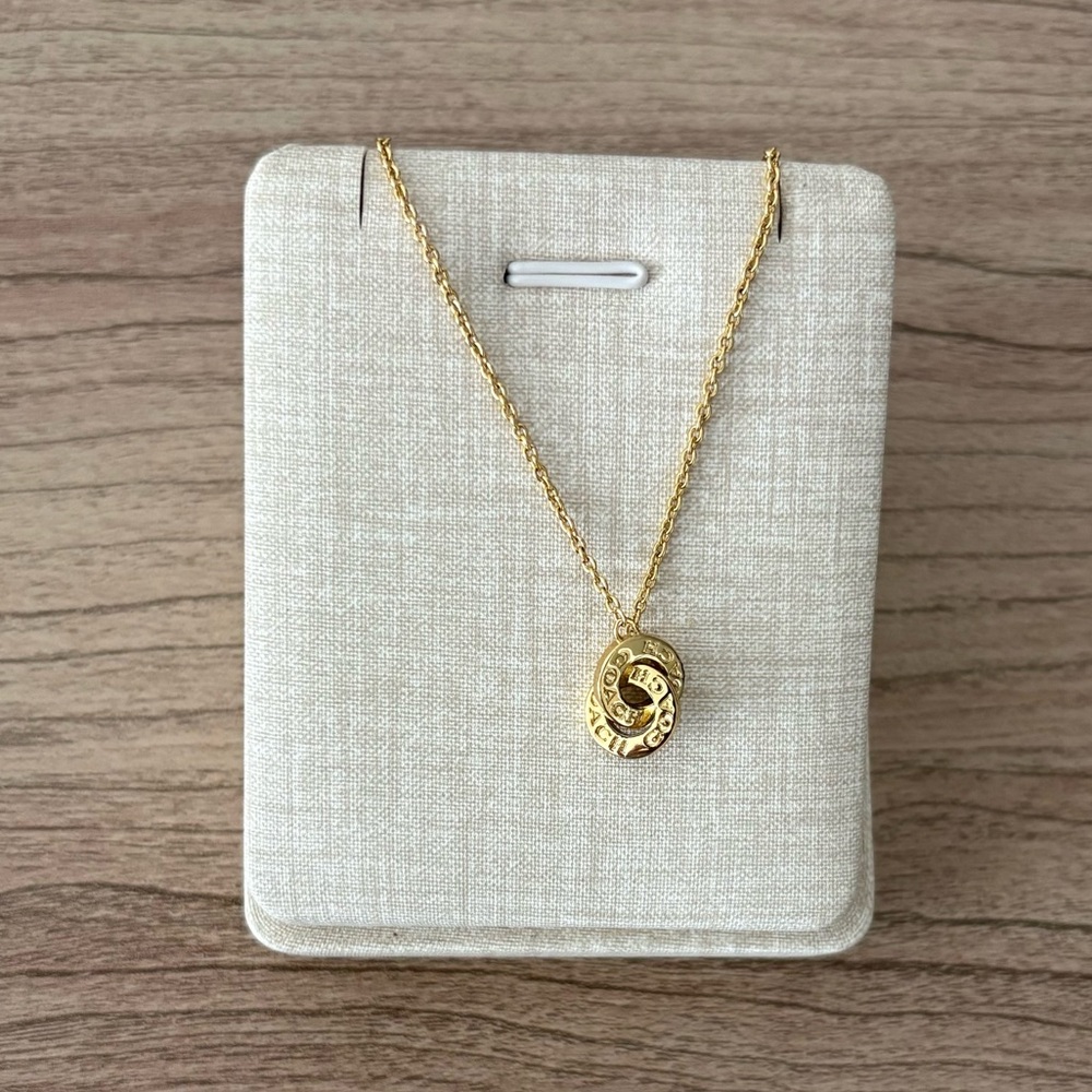 Coach interlocked logo Gold Pendant Necklace